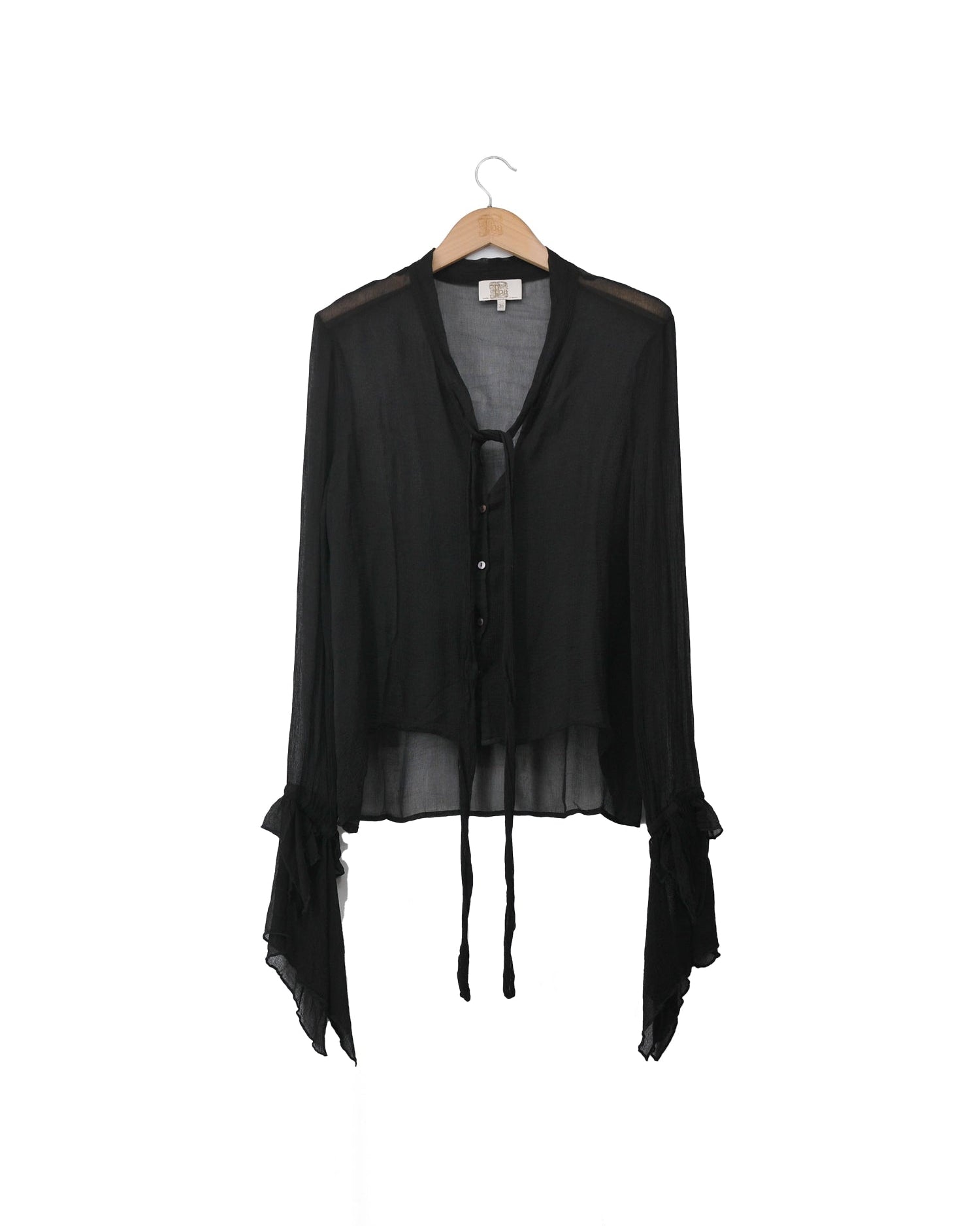 Women's sheer black chiffon Mia blouse with front tie closure, V-neckline, and flared ruffled cuffs by T.ba