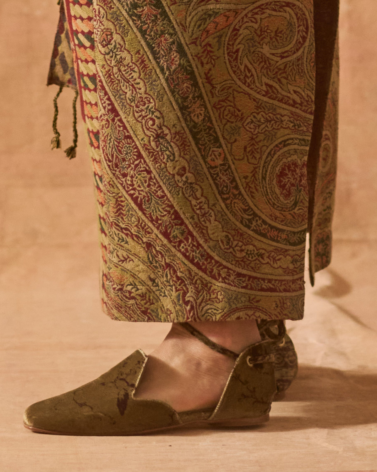 Detailed close-up view of olive mocca printed silk velvet Goya flat shoe with ankle tie strap for women T.ba