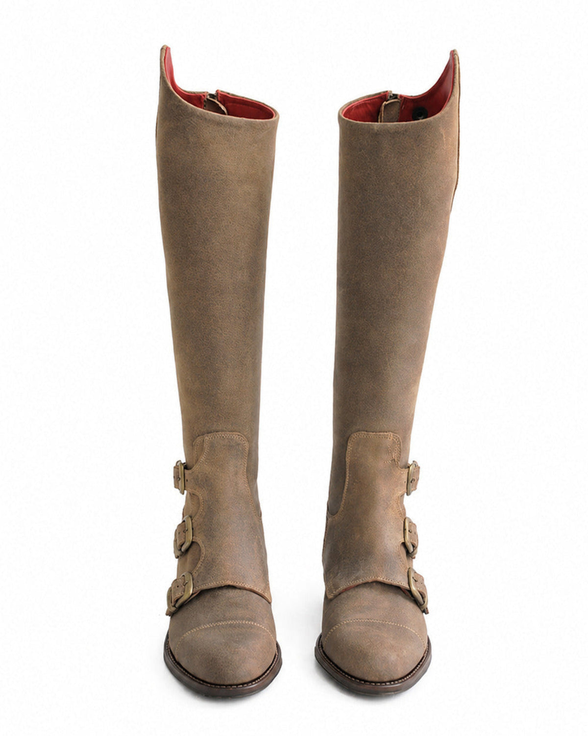 Pair shot front view of women's beige suede knee-high Buckle Boots featuring brass buckles and red inner lining T.ba