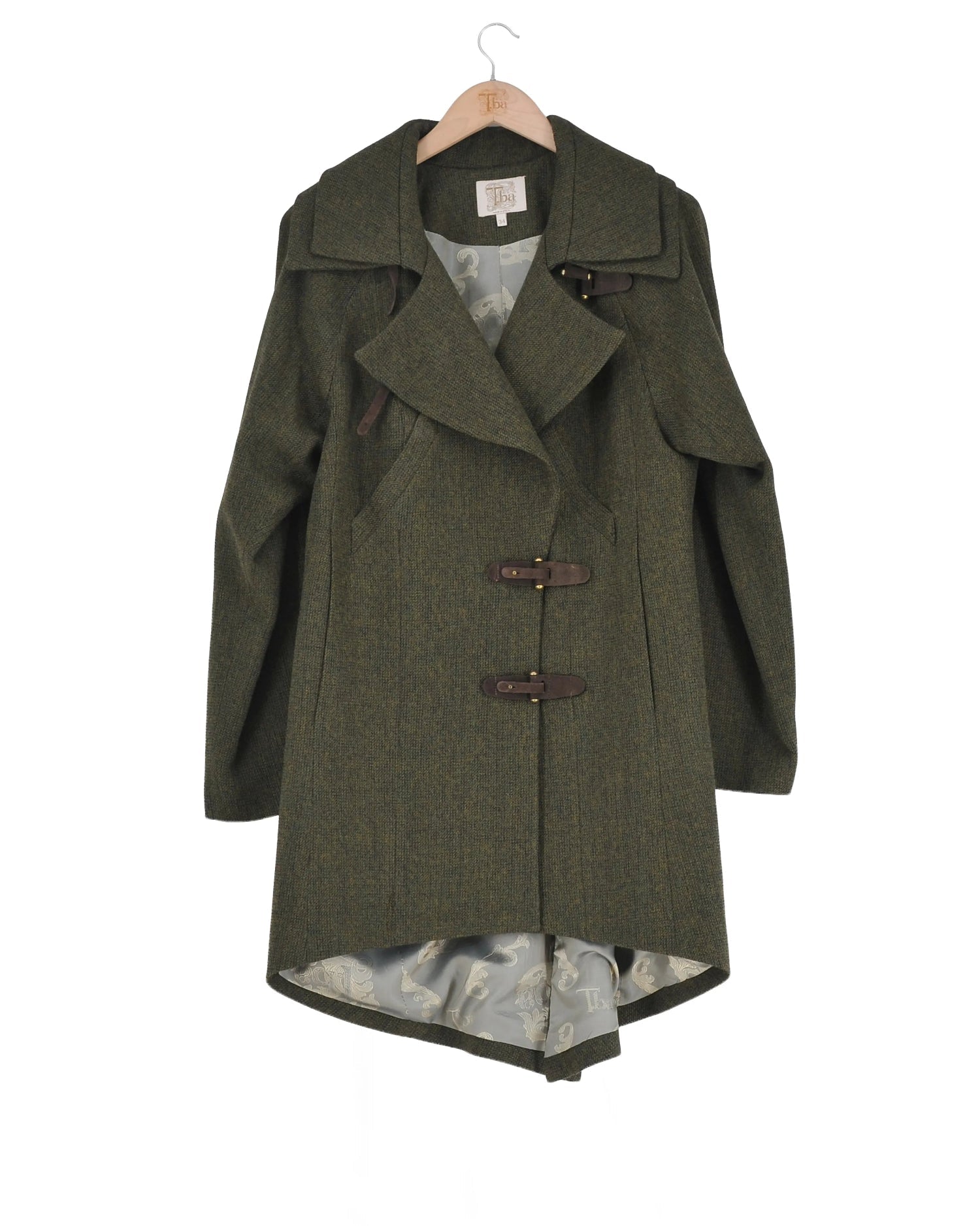 Women's Jerez Biella Field Coat in hunting green tweed wool featuring broad lapels, leather buckle closures, and high-low hem by T.ba
