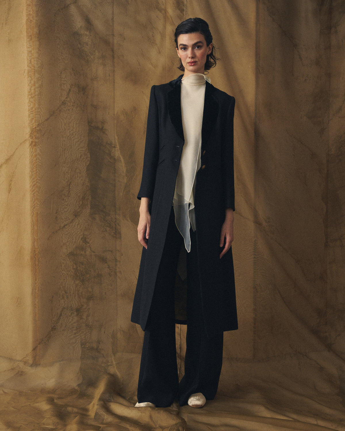 Full length front view of model wearing the Jerez Lancelot Combi Coat long wool tailored coat in black for women by T.ba