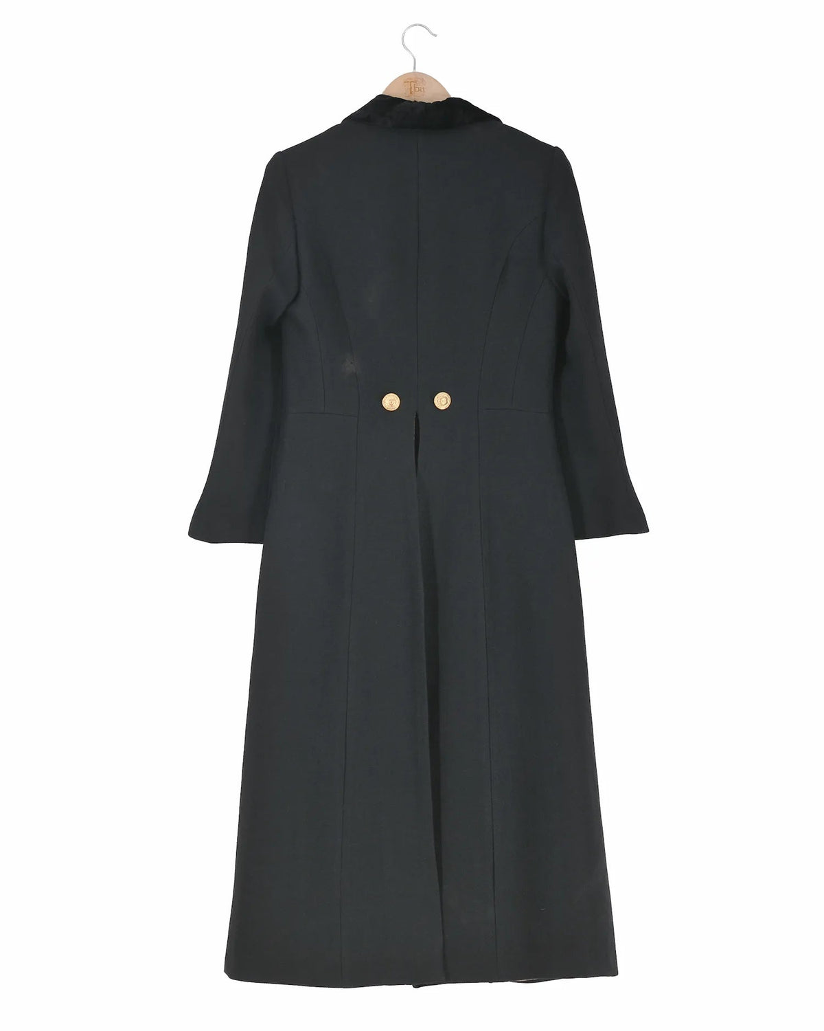 Back view of women's Lancelot Combi Jerez long coat in black wool with black velvet lapels and gold buttons by T.ba