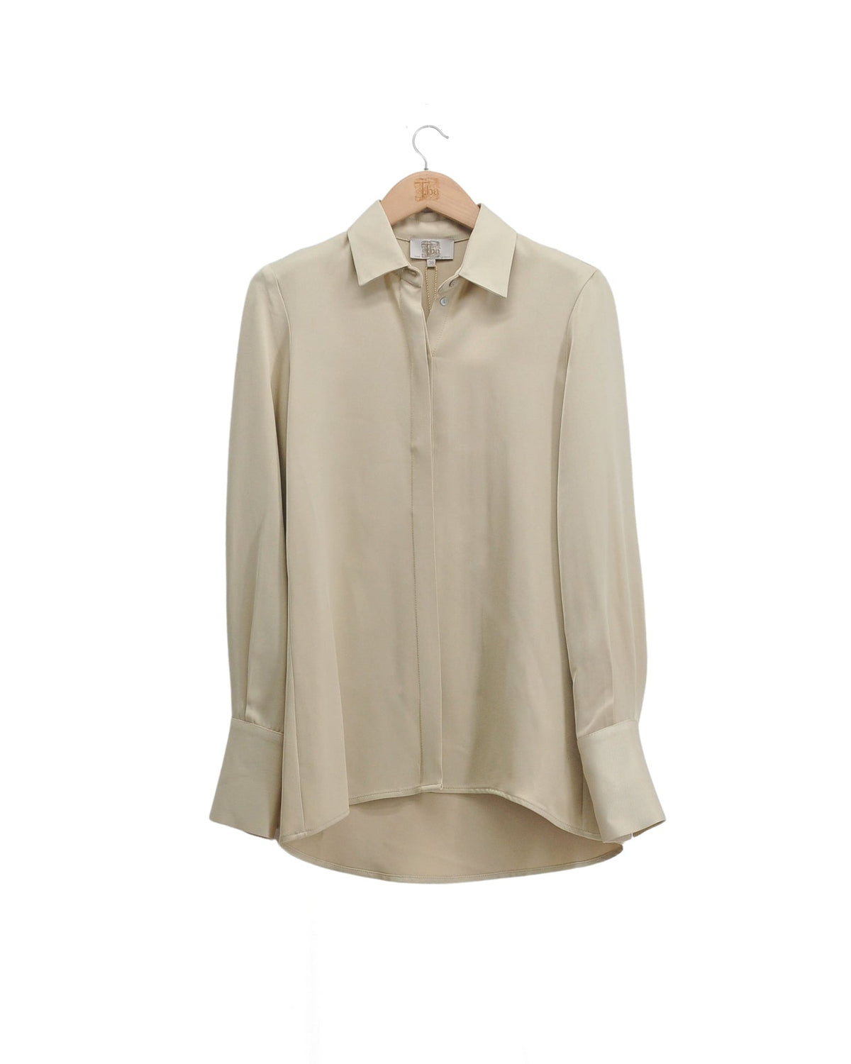 Rania shirt in beige sharkskin fabric featuring a classic shirt collar, long sleeves, and turned cuffs for women T.ba
