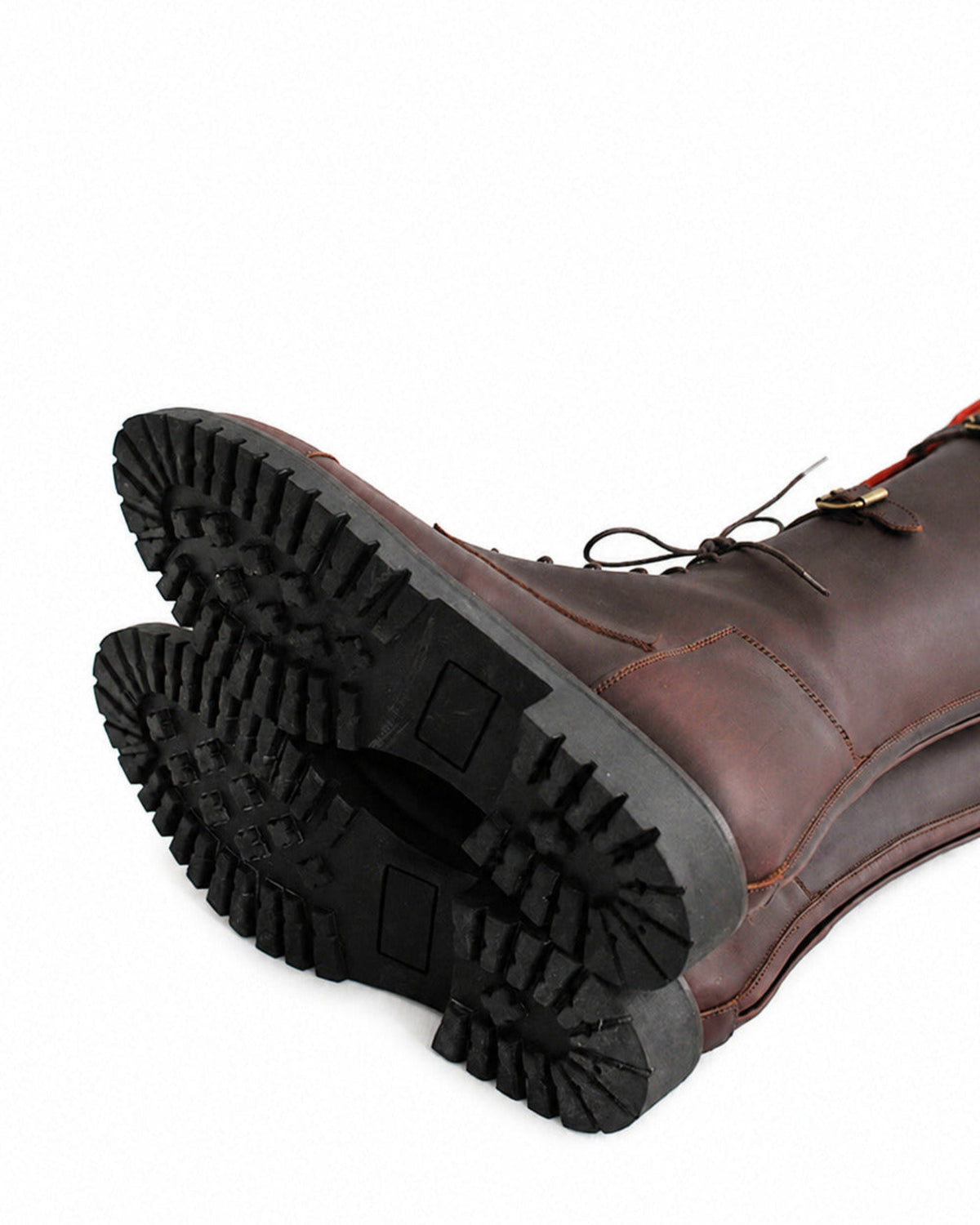 Bottom view highlighting non-slip rubber lug sole of dark brown straps leather boots T.ba