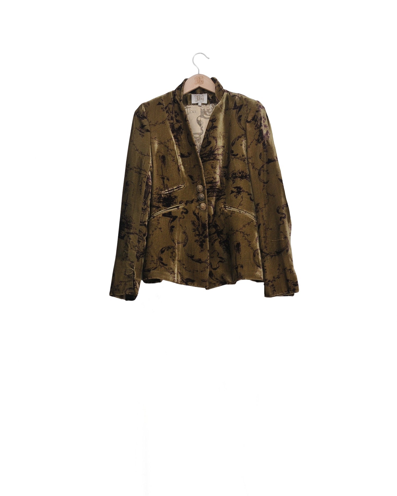 Front studio view on hanger of the short Sam silk velvet jacket in print mocca with standing collar by T.ba