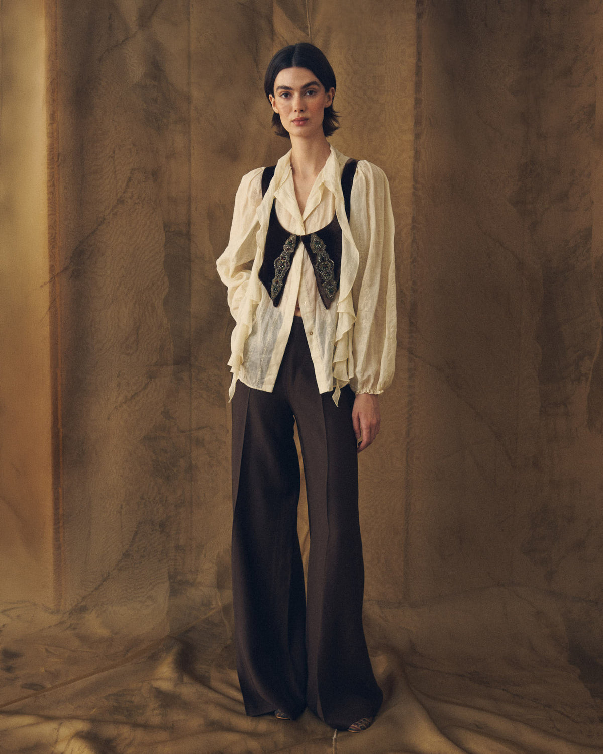 Full length front view of model wearing the fluid Sharkskin Maxi Pants in Truffle brown wide leg cut for women by T.ba
