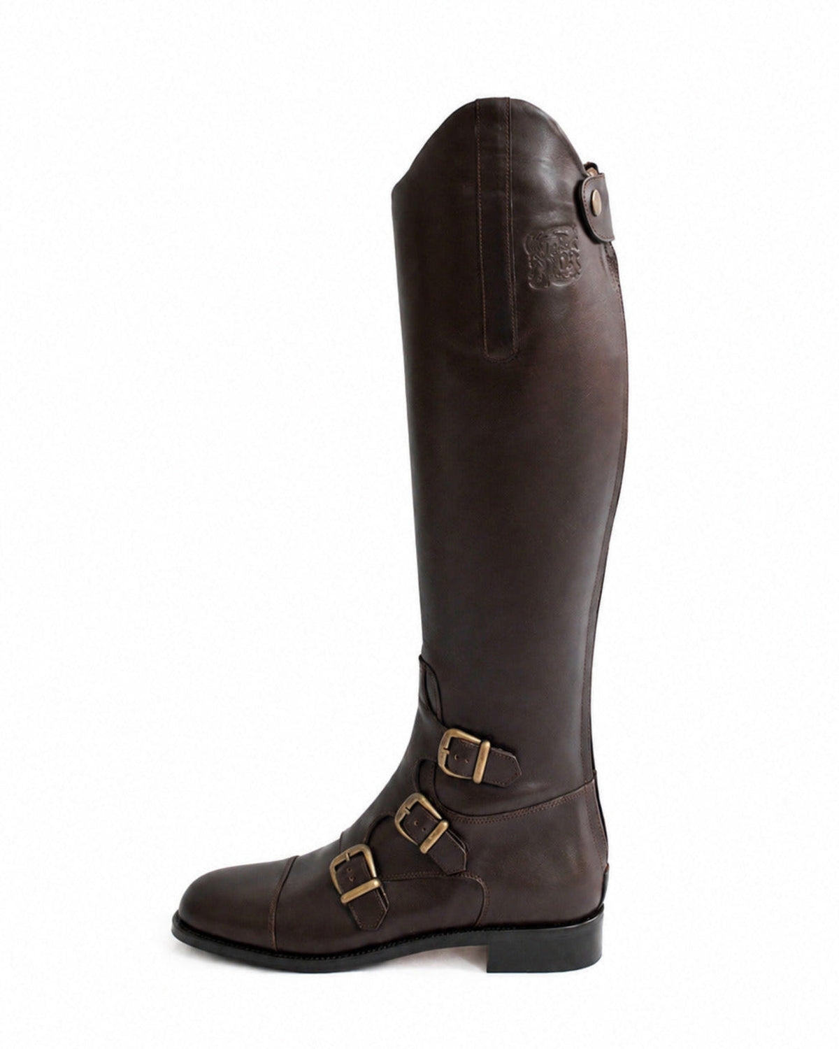 Side profile of knee-high dark brown leather riding boot featuring brass side buckles and logo detail T.ba