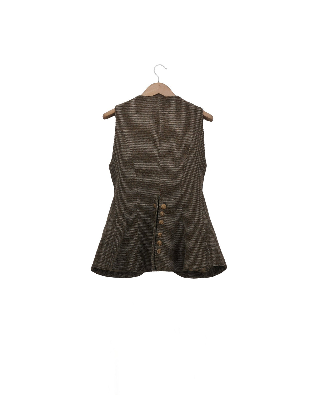 Back view of the Tweed Knit Baltea Vest in taupe brown wool tweed on a hanger showing the peplum tail structure by T.ba.
