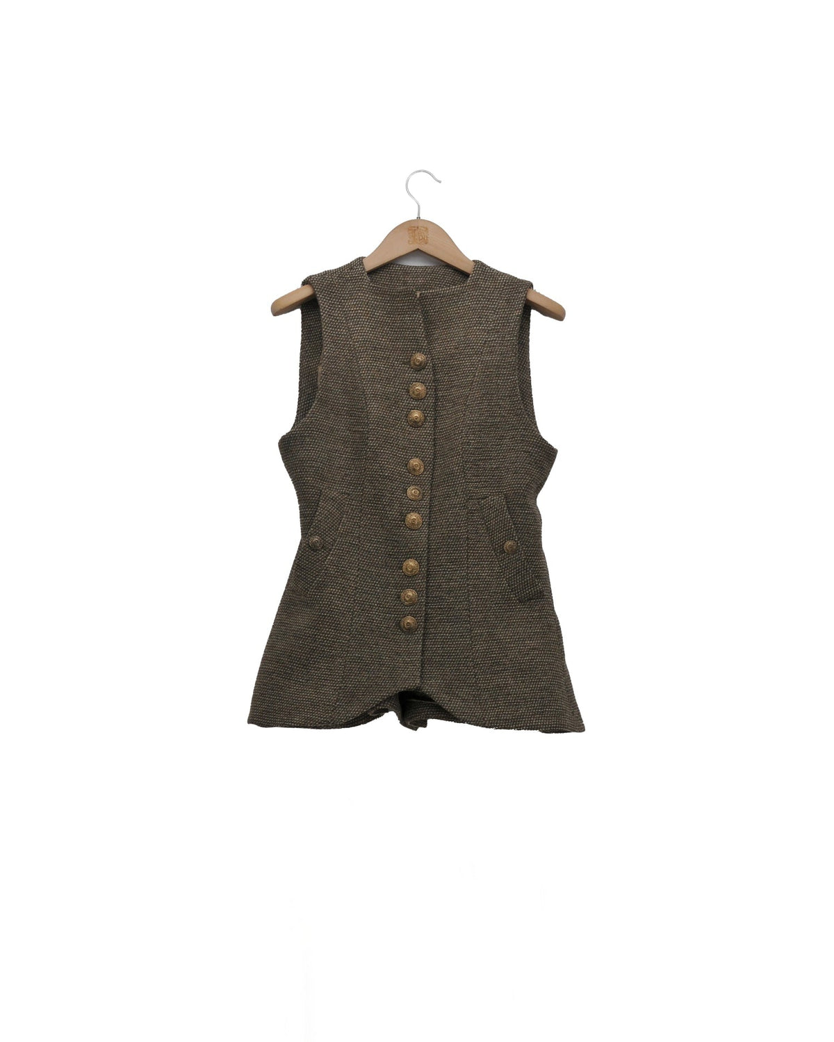 Front studio view of the Tweed Knit Baltea Vest in taupe brown wool tweed displayed on a wooden hanger by T.ba.