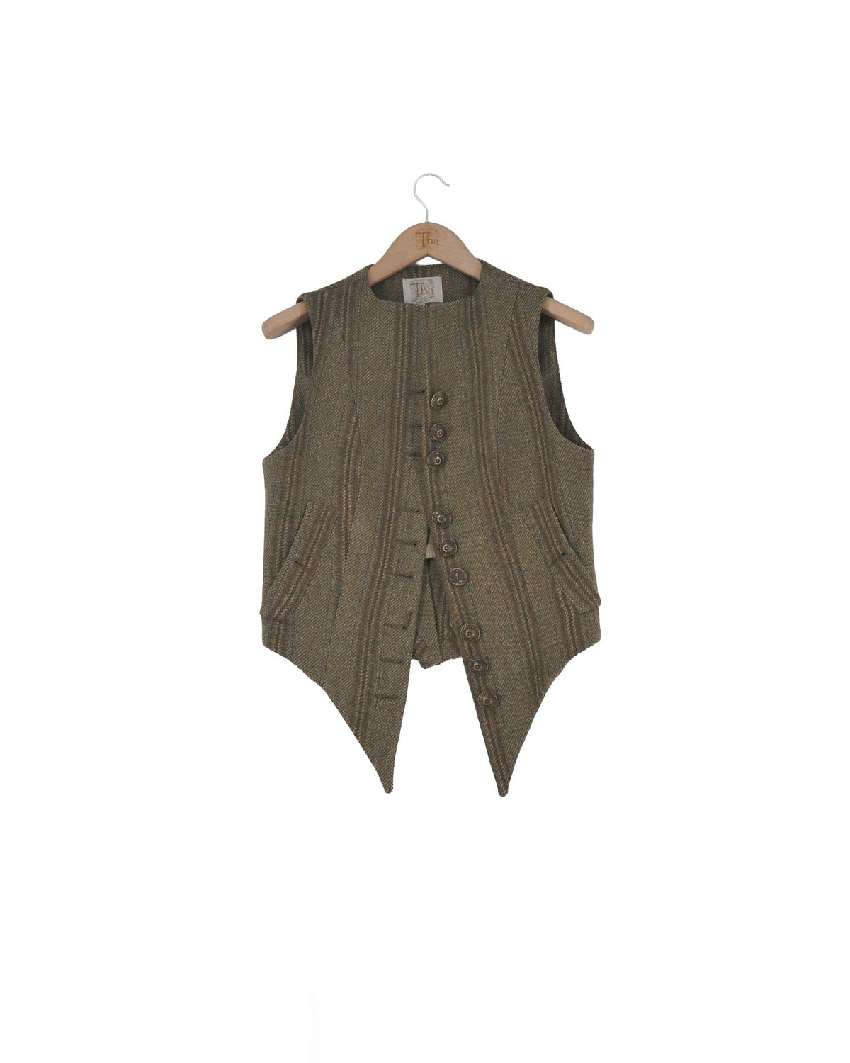 Front view of the Tweed Short Baltea Vest in green herringbone wool on a hanger with metallic buttons for women by T.ba.